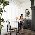 Home Balcony Interior Design with Round Table Wicker Chairs Green Plant and White Curtains