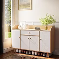 White And Wooden Shoe Cabinet With Drawers And Doors Indoor By Window With Potted Plant