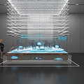 Visitors viewing modern exhibition display with transparent lighting structure and blue cloud shaped elements