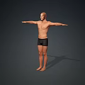 Man Standing Barefoot Shirtless in Black Shorts with Arms Outstretched Against Gray Background