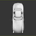 Sleek Silver Vintage Sports Car With Shiny Exterior And Classic Design Features
