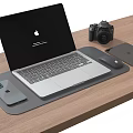 Apple Laptop On Wooden Desk With Mouse Pad Mouse Smartphone And Camera Setup