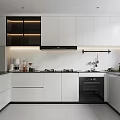 Modern Kitchen Interior With White Cabinets Black Appliances And Marble Countertops