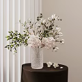White Pink Flowers In Transparent Textured Glass Vase On Dark Wooden Table With White Blinds