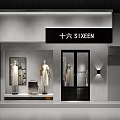 Modern Clothing Store Interior With Mannequins Displaying Dresses Clothes on Hangers and Display Table