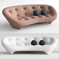 Brown And White Multi Seater Sofa With Tufted Design And Round Cushions