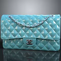 Elegant Light Blue Quilted Ladies Handbag With Chain Strap And Signature Logo