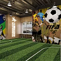 Indoor Sports Fitness Facility With Soccer Court Net Enclosure And Ceiling Lighting Design