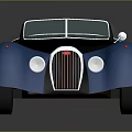 Blue And Black Vintage Car With Streamlined Body And Classic Front Grille