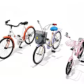 Three Stylish Bikes In White Orange Blue And Pink With Front Baskets And Seats