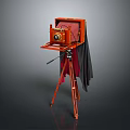 Vintage Wooden Camera with Red Tripod and Black Cloth Cover