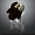 3D Cartoon Cow Figurine With Brown And White Fur And Light Horns