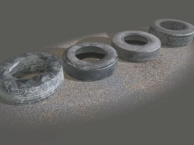 Four Old Worn Tires Placed On Gray Rough Ground Surface 3d model