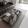 Modern Black Leather Sofa and Marble Coffee Table Set with Magazines and Decor