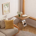 Living Room Side Table with Flower Vase Book Sofa Pillows and Window Blinds