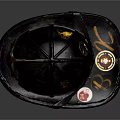 Vintage Black Firefighter Helmet with Worn Finish and Emblem Badges