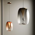 Modern Pendant Lights With Transparent Glass And Warm Orange Tones In Minimalist Interior