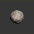 Rough Surface Stone Sphere In Brown And White Color On Dark Background With Reflection