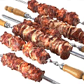 Black Metal Barbecue Grill with Charcoal and Meat Skewers on Wooden Handles