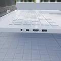 Sleek White Laptop With Ultra Thin Design And High Definition Display Screen For Portable Use