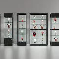 Row of Black Glass Door Display Cabinets with Collectible Figurines