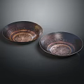 Two Decorative Metal Bowls With Intricate Patterns For Home Decoration