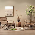 Wicker Lounge Chairs In Cozy Indoor Setting With Potted Plant Decorative Painting And Wooden Table