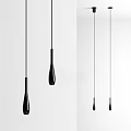 Modern Black Teardrop Shaped Pendant Lights Hanging In Minimalist Interior Design