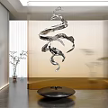 Modern Metal Sculpture with Twisted Spiral Design Hanging Indoor with Light Curtain Background