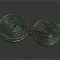 Ancient Bronze Circular Sculptures With Intricate Spiral Patterns And Linked Design
