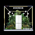 Floral Installation in Pop-up Store with Transparent Glass Cabin White Refrigerator Green Plants and Woman