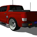 Red Toyota Tundra Pickup Truck With Stylish Exterior And Large Alloy Wheels
