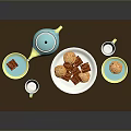 Wooden Dining Table With Blue Teapot Blue Mugs Cookies And Plates