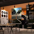 Casual Lounge Area With Seating Tables Chairs And Decorative Wall Art