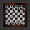 Wooden Chess Set With Black And White Pieces On Checkerboard