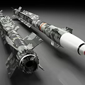 Camouflage Military Missiles With White Warhead Red Tip And Engine Section Displayed On Gray Background