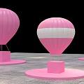 Pink Hot Air Balloon Photo Check in Spot Featuring Checkered Pattern and Round Platforms