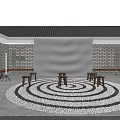 Traditional Courtyard Featuring Spiral Patterned Ground And Projection Of People Under Evening Lighting