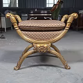 Elegant Golden Sofa Bench With Intricate Carved Frame And Patterned Fabric Cushion