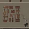 Wooden Wall Decor Featuring Various Sized Blocks In Grid Pattern With Vase