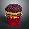 Delicious Cupcake With Red Paper Cup And Dark Brown Swirl Top Yellow Cream Filling