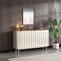White Vertical Striped Sideboard With Table Lamp Wine Bottles Green Plant Against Dark Wooden Wall