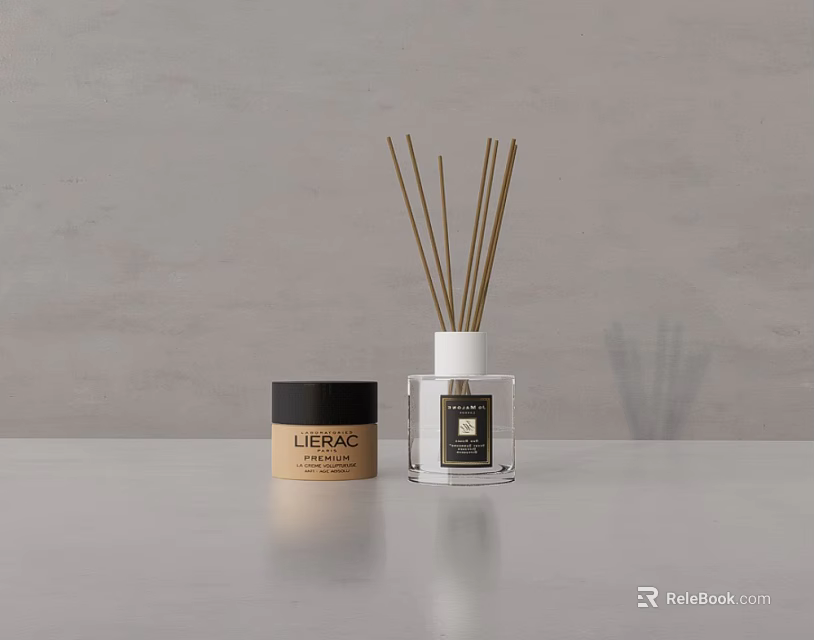 Elegant Bathroom Accessories Featuring Glass Reed Diffuser And Scented Candle Jar 3d model