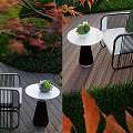 Stylish Outdoor Sofa With Black Rattan Frame Green Cushions And Side Table On Wooden Deck