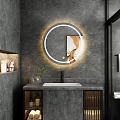 Round LED Illuminated Bathroom Mirror on Gray Wall with Modern Faucet and Decorative Plant