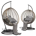 Stylish Rattan Hanging Chairs With Black Metal Frames Gray White Cushions And Cozy Blankets