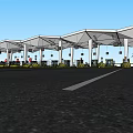 Traffic Facility with Multiple Lanes Canopy Structures Lane Markings and Booths Under Blue Sky
