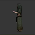 Man Wearing Green Hooded Robe With Intricate Design Standing Against Simple Gray Background