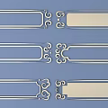 Ornate Carved Metal Decorative Strips Featuring Intricate Patterns on Blue Background