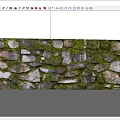 Natural Stone And Wood Wall Design Featuring Mossy Rocks And Rustic Accents